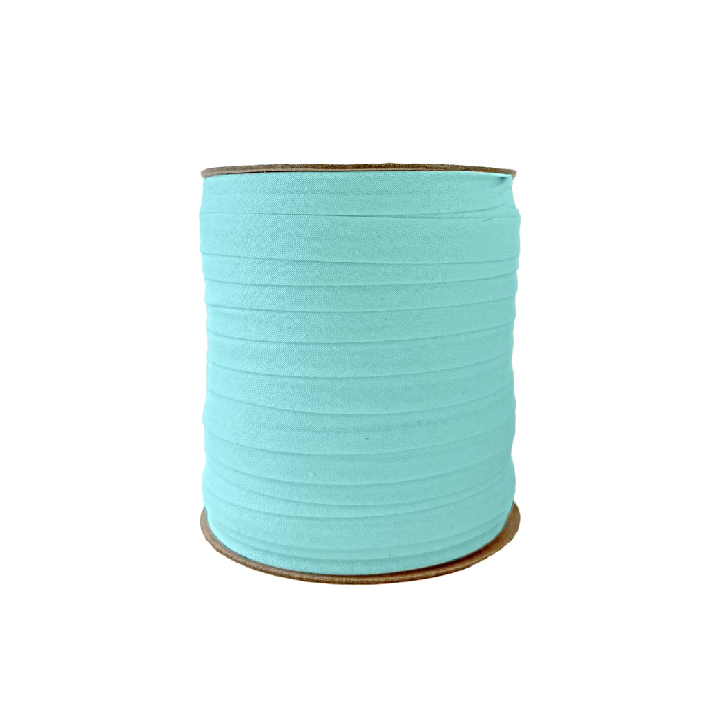 aqua 1/2" single fold bias tape on a spool from Heit's Wholesale bulk sewing supply company