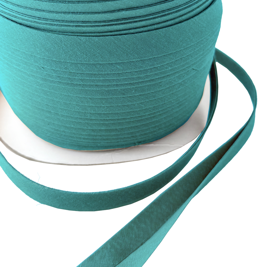 close up of the aquarius blue 1/2" double fold bias tape on a spool from Heit's Wholesale bulk sewing supply company