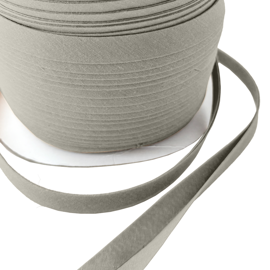 close up of the ash gray 1/2" double fold bias tape on a spool from Heit's Wholesale bulk sewing supply 