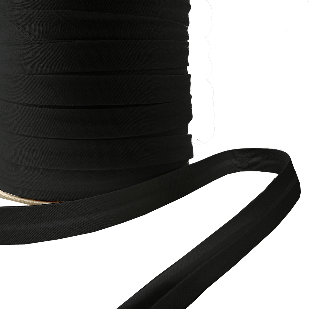 close up of the black 1/2" single fold bias tape on a spool from Heit's Wholesale bulk sewing supply company
