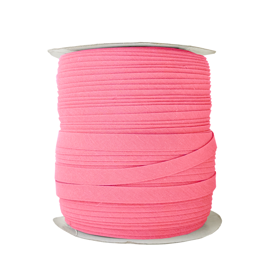 bubblegum 1/2" double fold bias tape on a spool from Heit's Wholesale bulk sewing supply company
