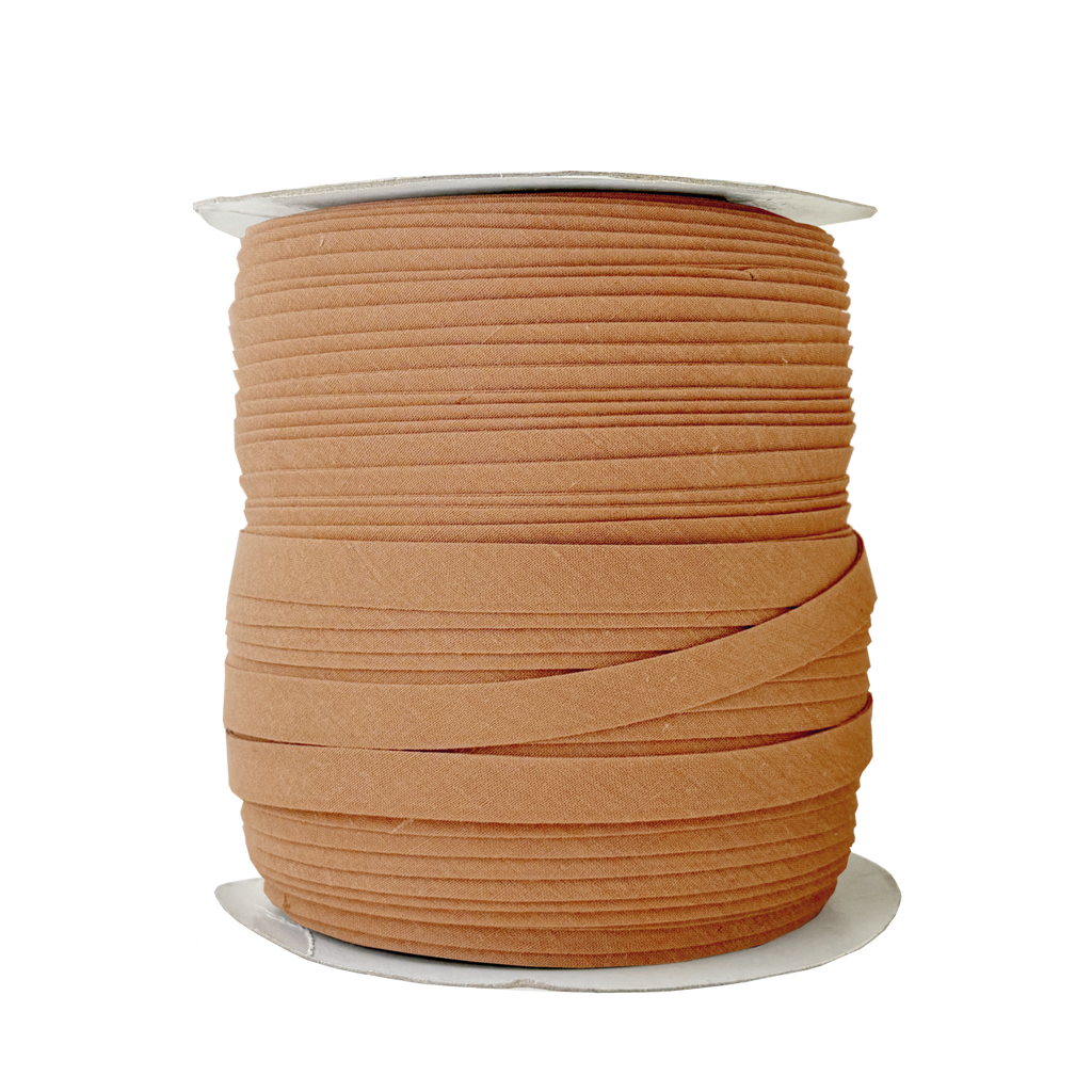 camel brown 1/2" double fold bias tape on a spool from Heit's Wholesale bulk sewing supply company