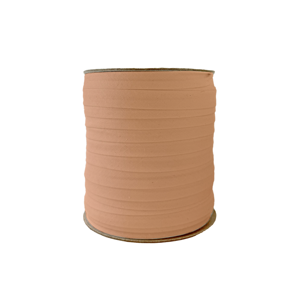 camel brown 1/2" single fold bias tape on a spool from Heit's Wholesale bulk sewing supply company