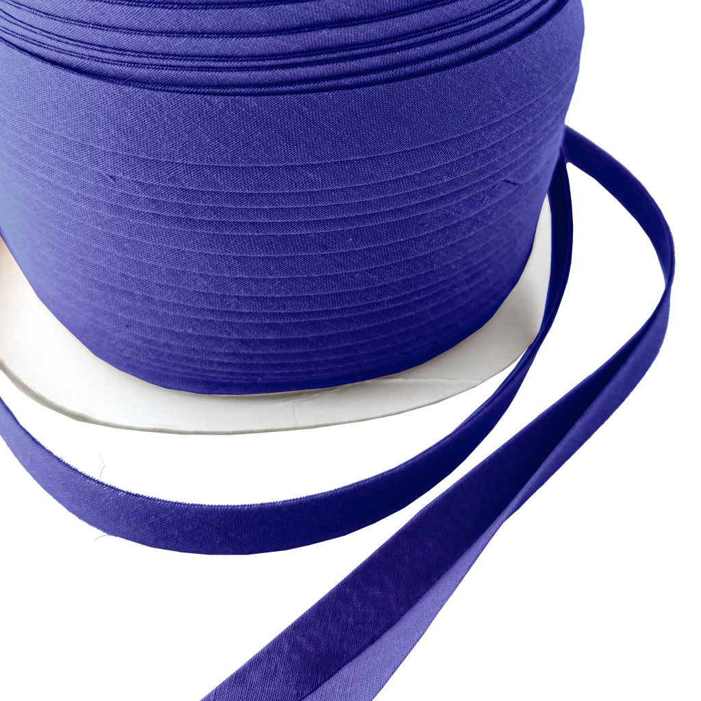 close up of the classic blue 1/2" double fold bias tape on a spool from Heit's Wholesale bulk sewing supply company