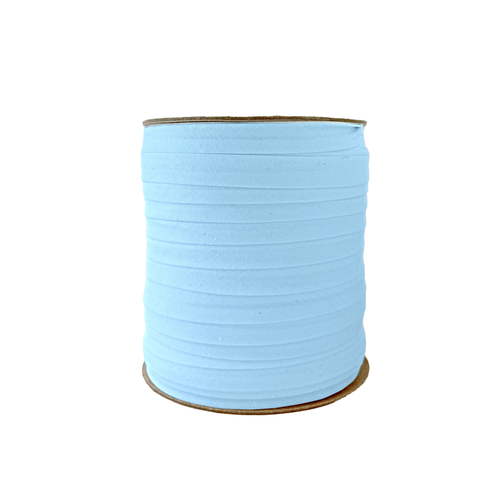 cloud blue 1/2" single fold bias tape on a spool from Heit's Wholesale bulk sewing supply company