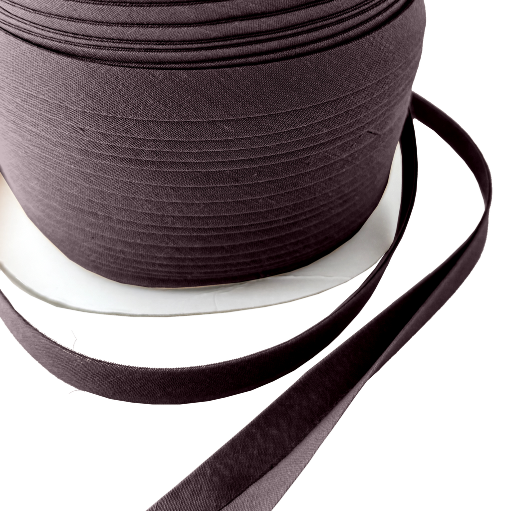 close up of the coal dust 1/2" double fold bias tape on a spool from Heit's Wholesale bulk sewing supply company