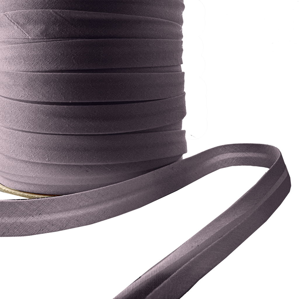 close up of the coal dust 1/2" single fold bias tape on a spool from Heit's Wholesale bulk sewing supply company