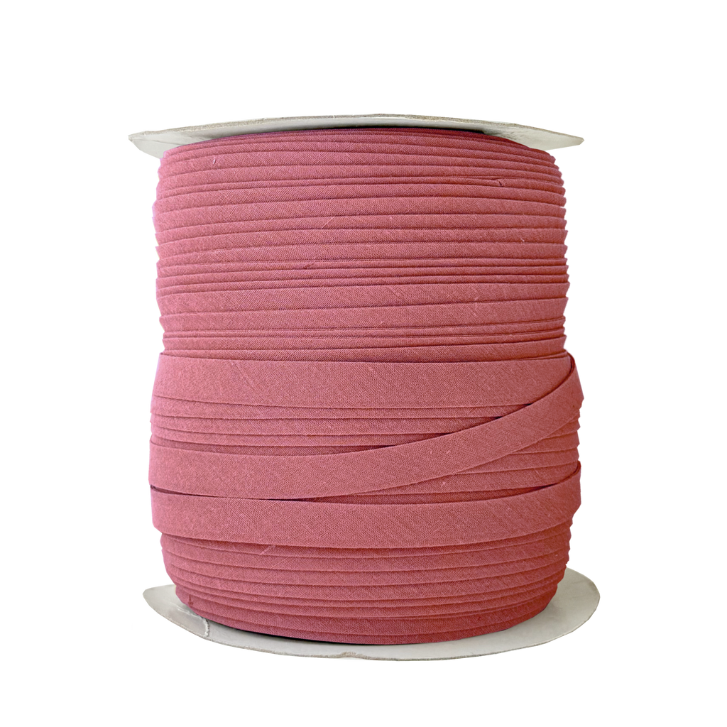 copper 1/2" double fold bias tape on a spool from Heit's Wholesale bulk sewing supply company