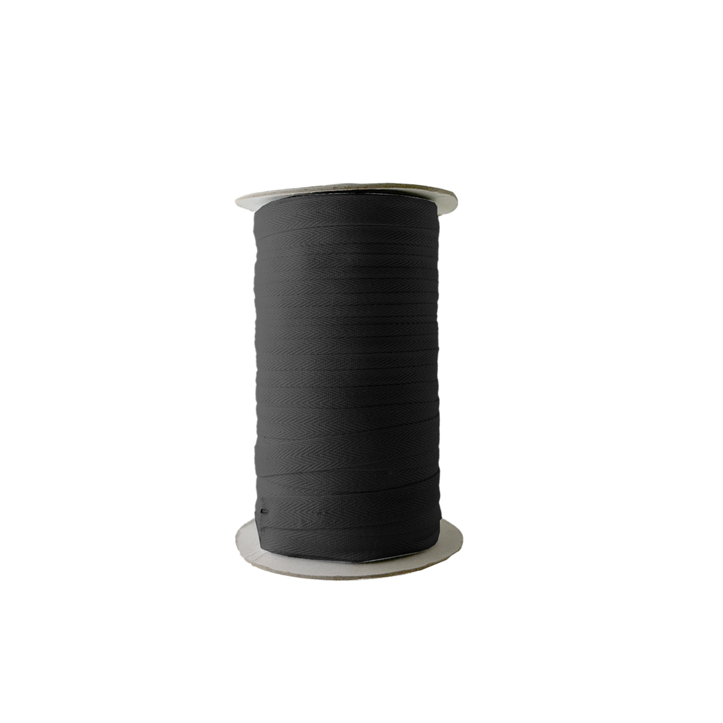 black 1/2" cotton twill tape on a spool from Heit's Wholesale bulk sewing supply company