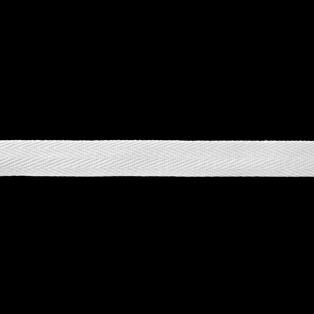 close up of the white 1/2" cotton twill tape on a spool from Heit's Wholesale bulk sewing supply company