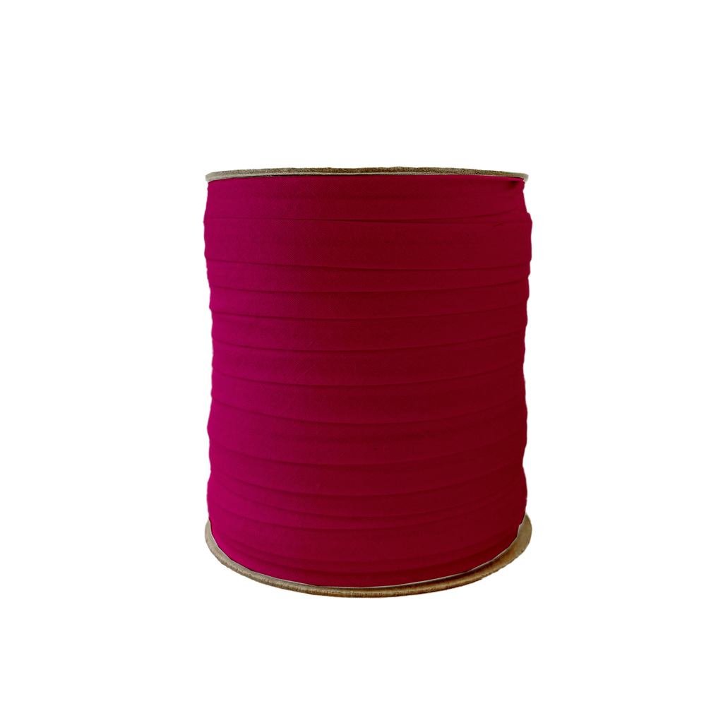 cranberry 1/2" single fold bias tape on a spool from Heit's Wholesale bulk sewing supply company