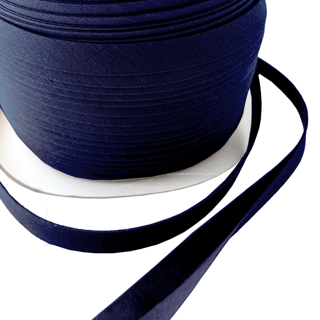close up of the dark navy 1/2" double fold bias tape on a spool from Heit's Wholesale bulk sewing supply company