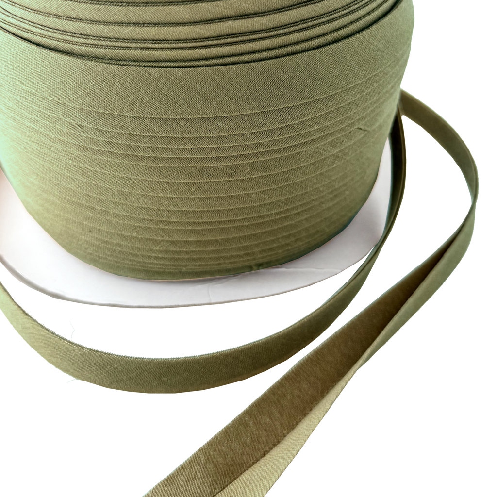 close up of the dark olive 1/2" double fold bias tape on a spool from Heit's Wholesale bulk sewing supply company