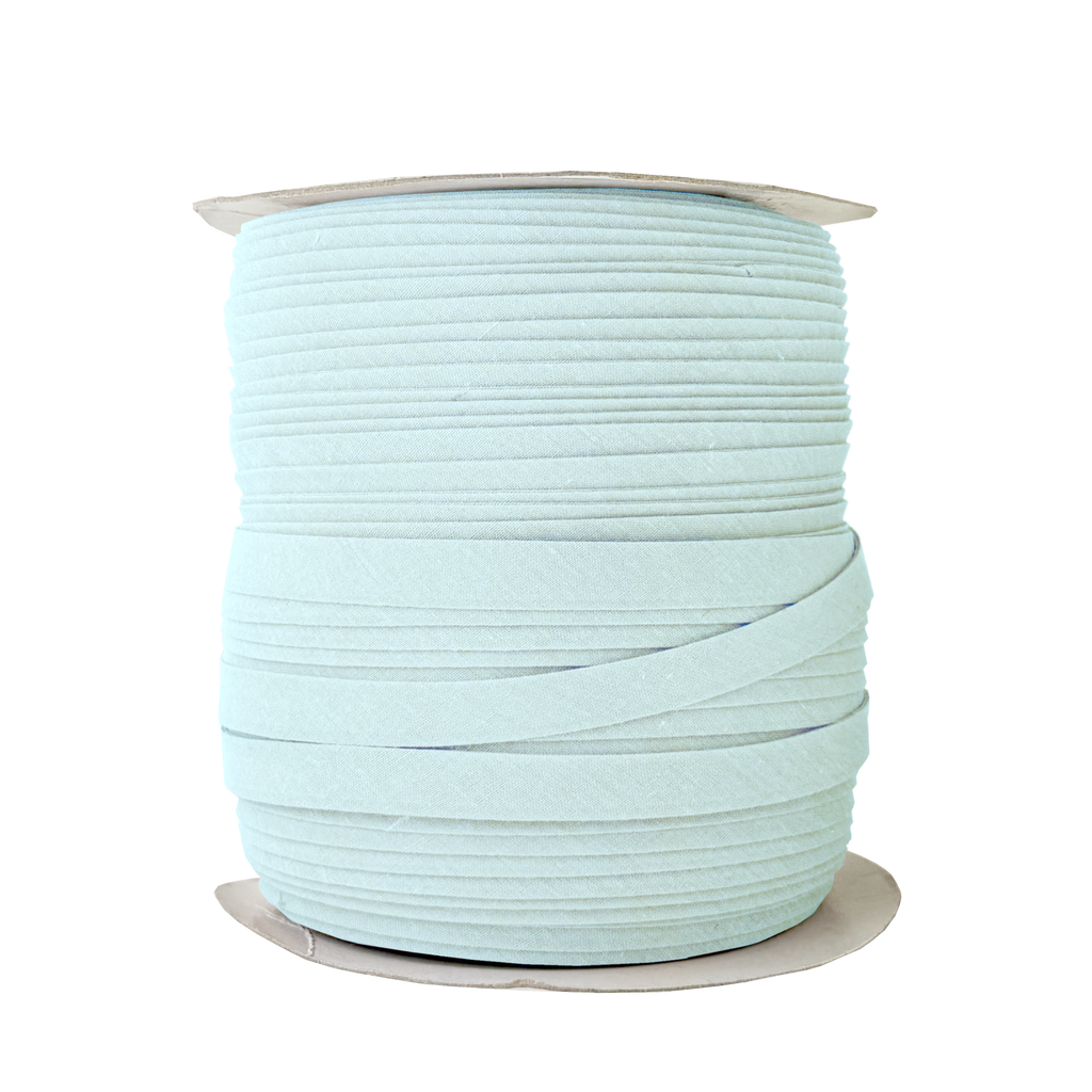 frost blue 1/2" double fold bias tape on a spool from Heit's Wholesale bulk sewing supply company
