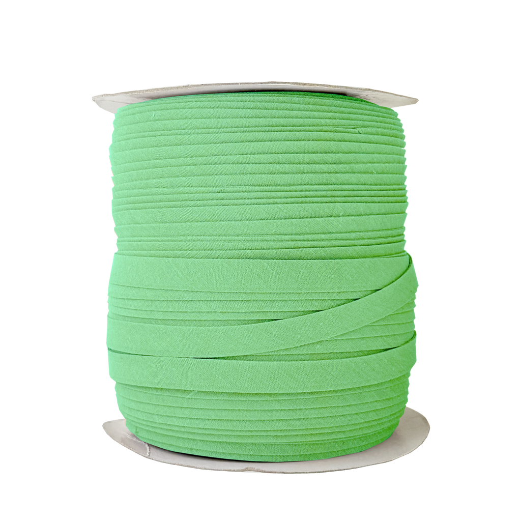 gypsy green 1/2" double fold bias tape on a spool from Heit's Wholesale bulk sewing supply company