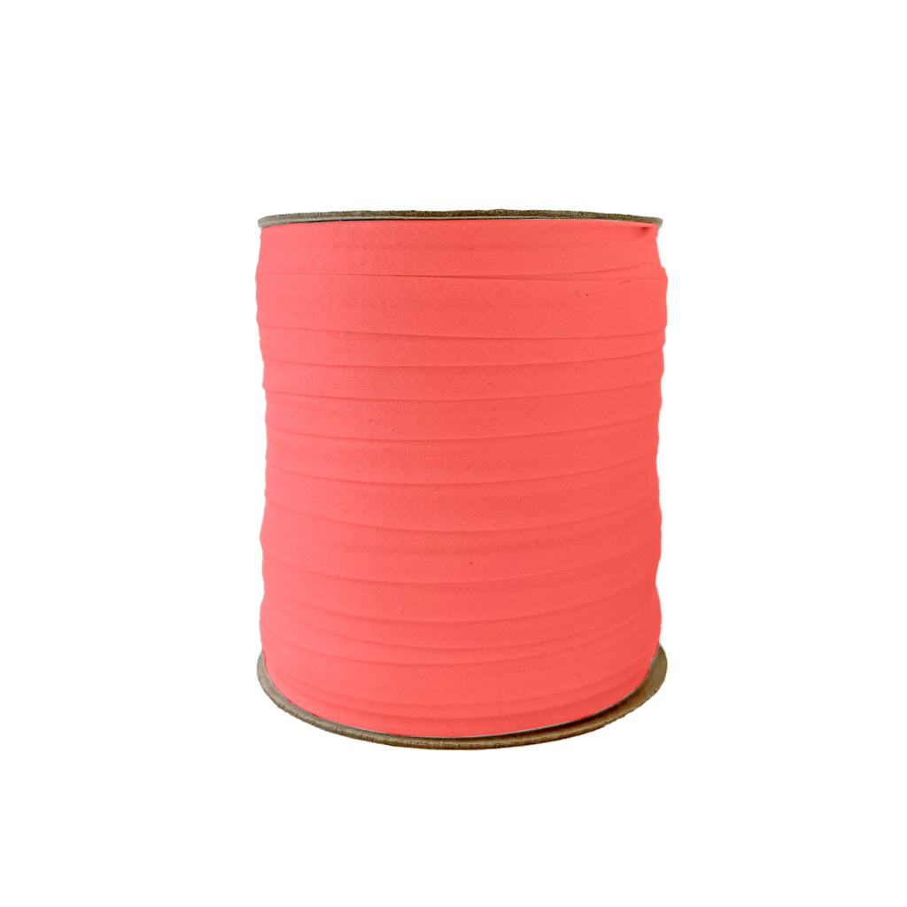red 1/2" single fold bias tape on a spool from Heit's Wholesale bulk sewing supply company