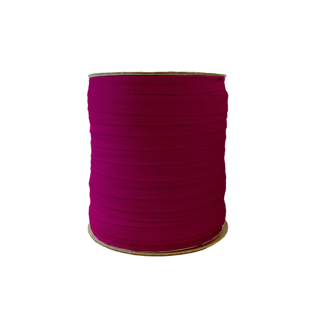 ruby 1/2" single fold bias tape on a spool from Heit's Wholesale bulk sewing supply company