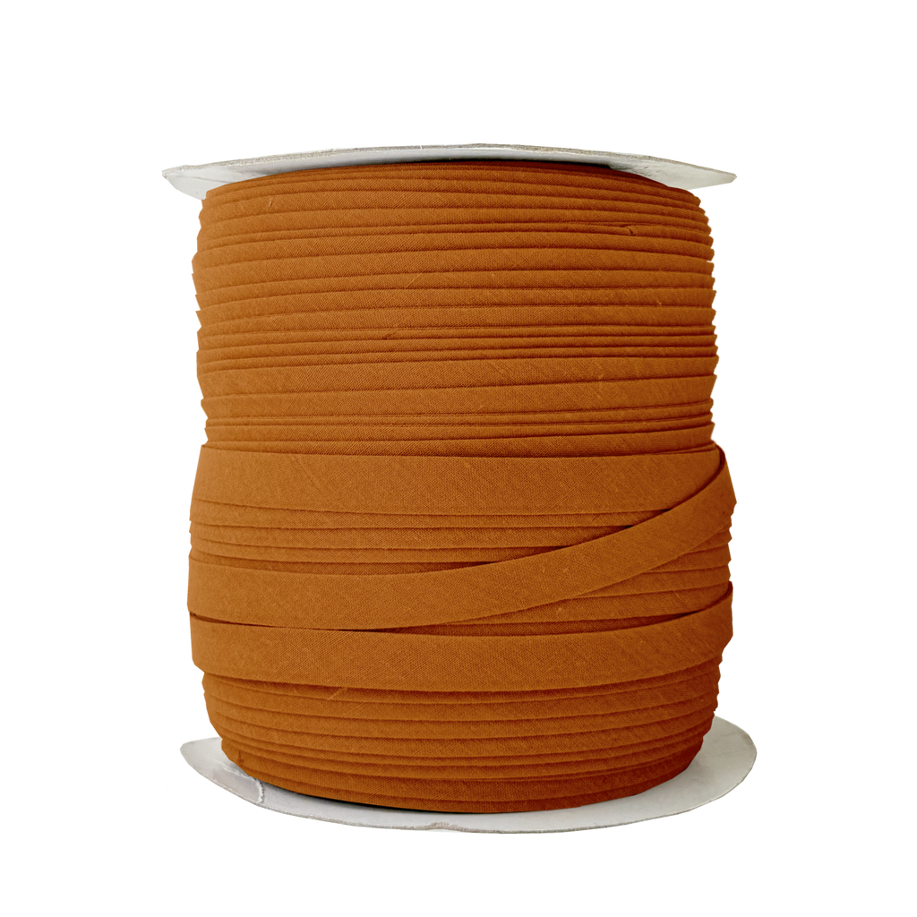 rust 1/2" double fold bias tape on a spool from Heit's Wholesale bulk sewing supply company