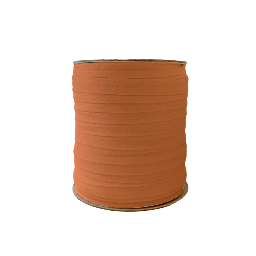 rust 1/2" single fold bias tape on a spool from Heit's Wholesale bulk sewing supply company