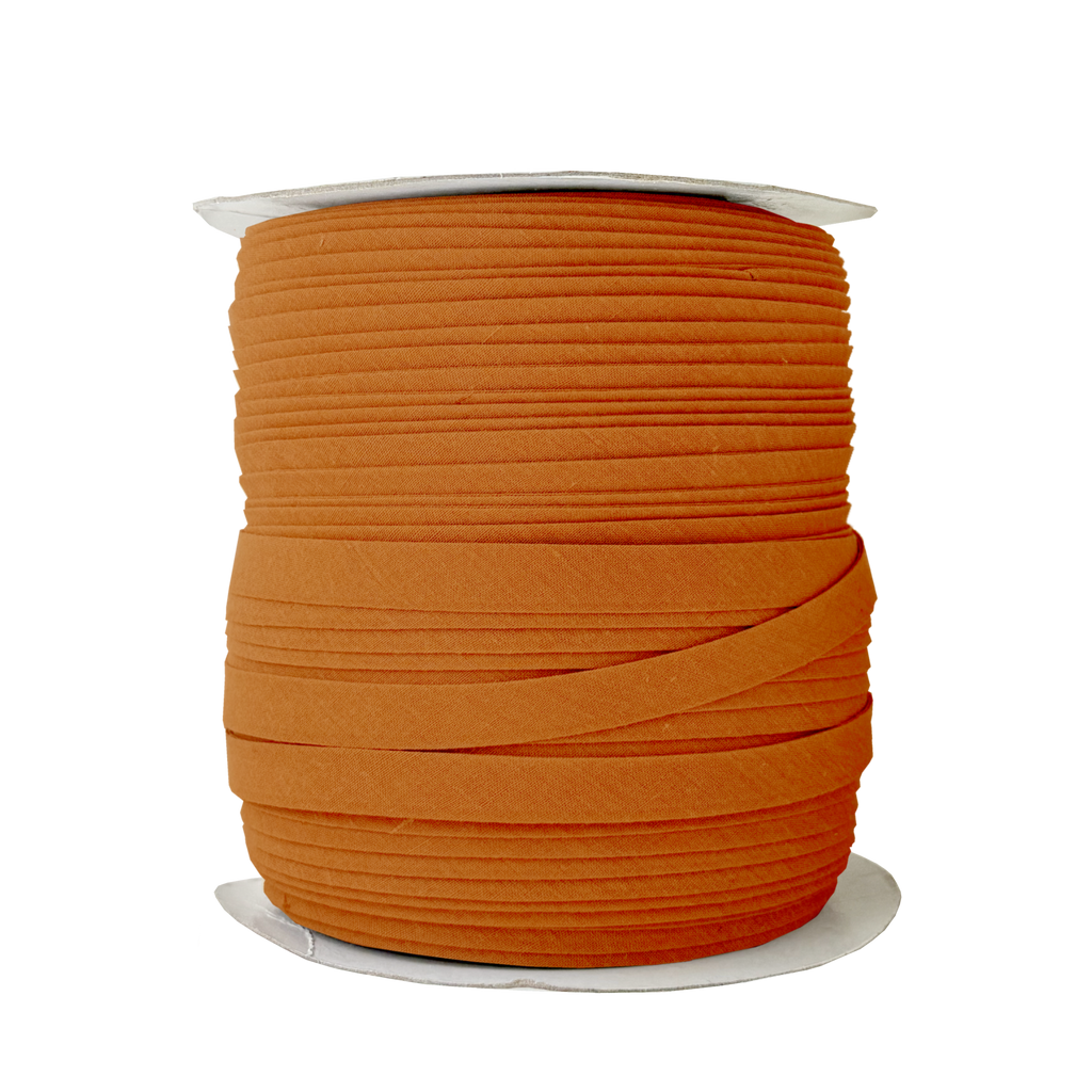tarnish gold 1/2" double fold bias tape on a spool from Heit's Wholesale bulk sewing supply company