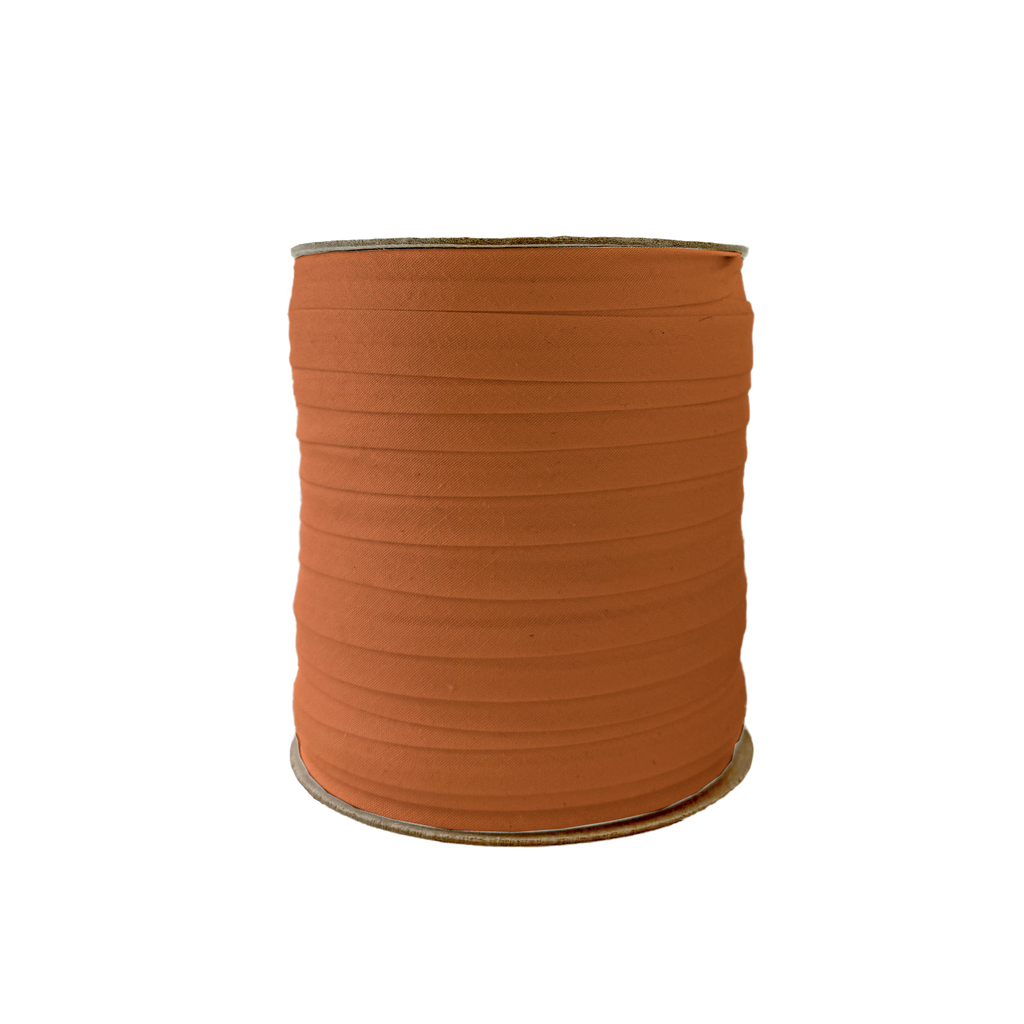 tarnish gold 1/2" single fold bias tape on a spool from Heit's Wholesale bulk sewing supply company
