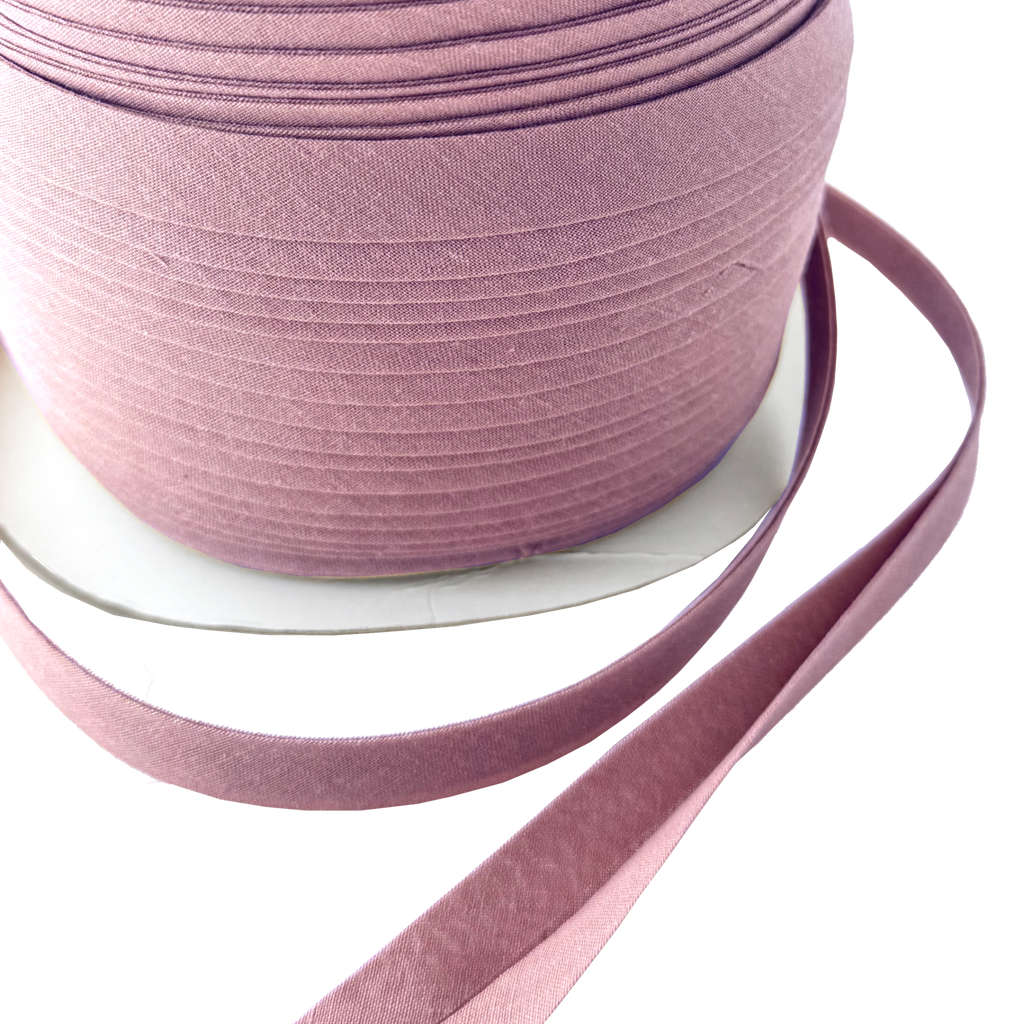close up of the verrazano 1/2" double fold bias tape on a spool from Heit's Wholesale bulk sewing supply company