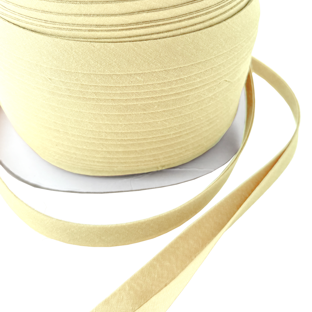 close up for the yellow 1/2" double fold bias tape on a spool from Heit's Wholesale bulk sewing supply company