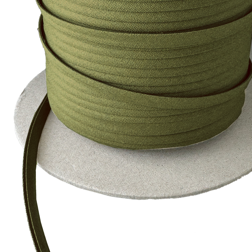 close up of the black olive 1/4" double fold bias tape on a spool from Heit's Wholesale bulk sewing supply company