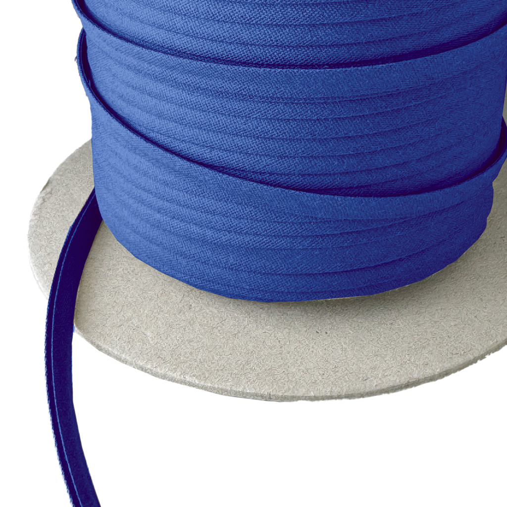 close up of the broker blue 1/4" double fold bias tape on a spool from Heit's Wholesale bulk sewing supply company