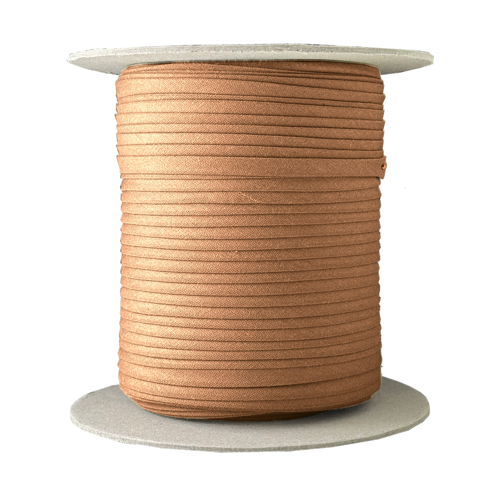 camel brown 1/4" double fold bias tape on a spool from Heit's Wholesale bulk sewing supply company
