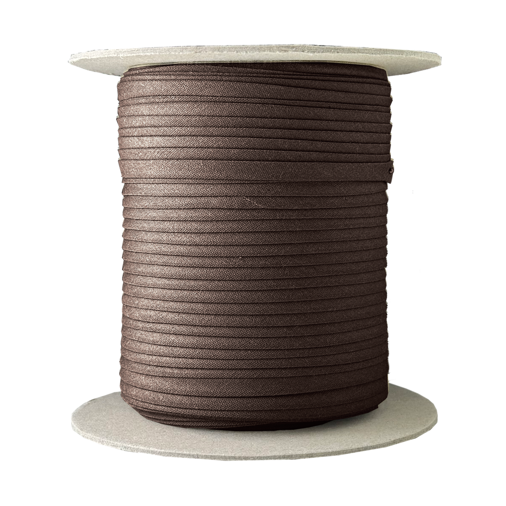 charlie brown 1/4" double fold bias tape on a spool from Heit's Wholesale bulk sewing supply company