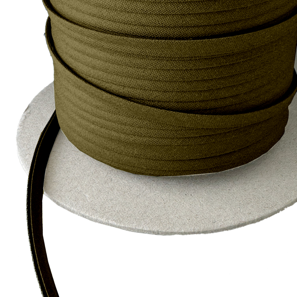 close up photo of the coffee brown 1/4" double fold bias tape on a spool from Heit's Wholesale bulk sewing supply company
