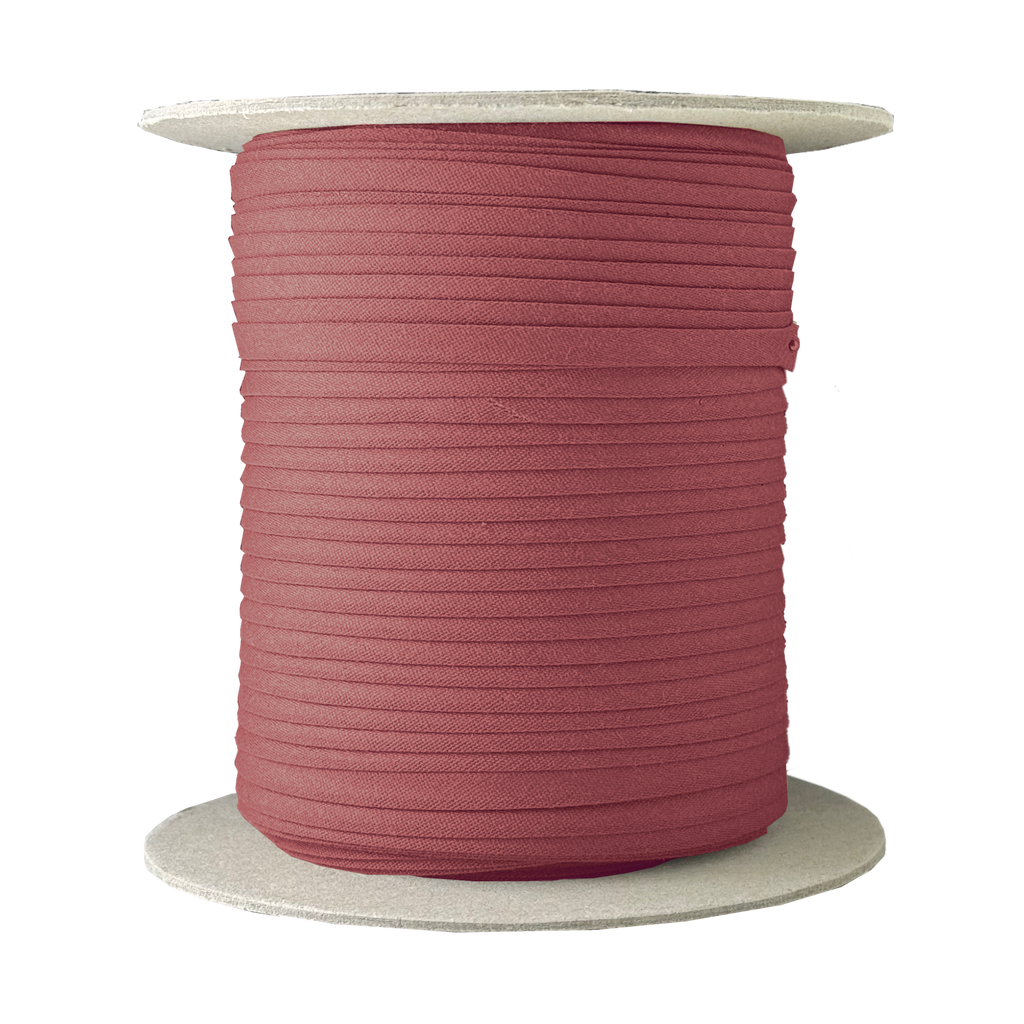 copper 1/4" double fold bias tape on a spool from Heit's Wholesale bulk sewing supply company