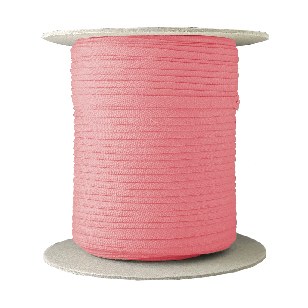 coral pink 1/4" double fold bias tape on a spool from Heit's Wholesale bulk sewing supply company
