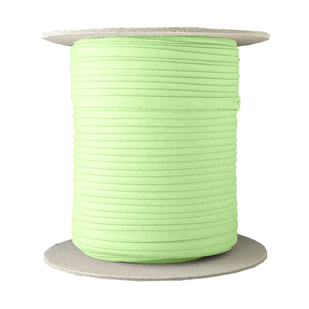 minty green 1/4" double fold bias tape on a spool from Heit's Wholesale bulk sewing supply company