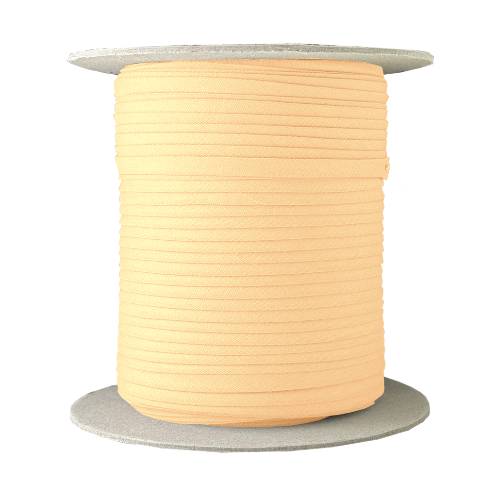 peach cream 1/4" double fold bias tape on a spool from Heit's Wholesale bulk sewing supply company