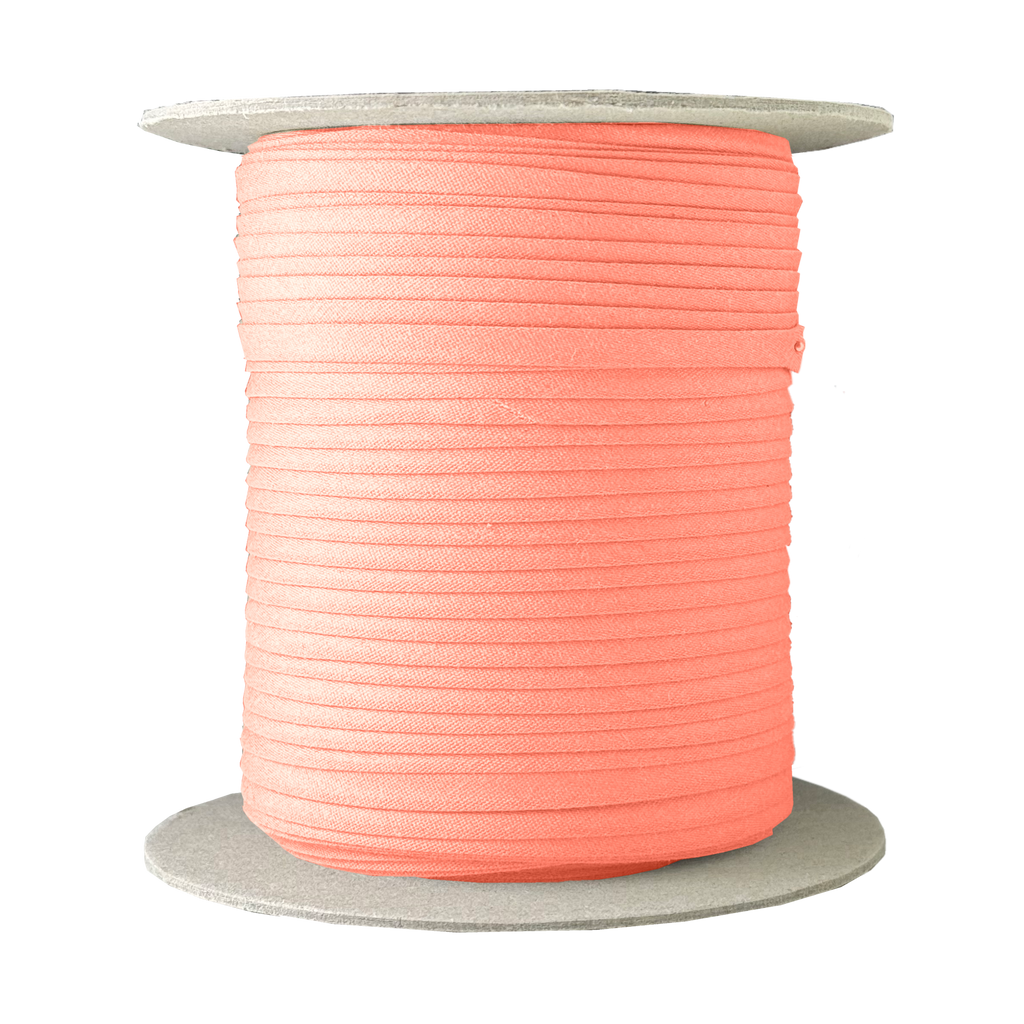 peachtone 1/4" double fold bias tape on a spool from Heit's Wholesale bulk sewing supply company
