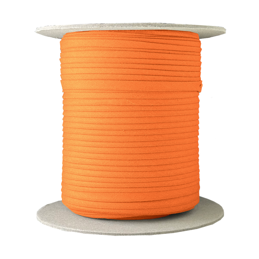 pumpkin pie orange 1/4" double fold bias tape on a spool from Heit's Wholesale bulk sewing supply company