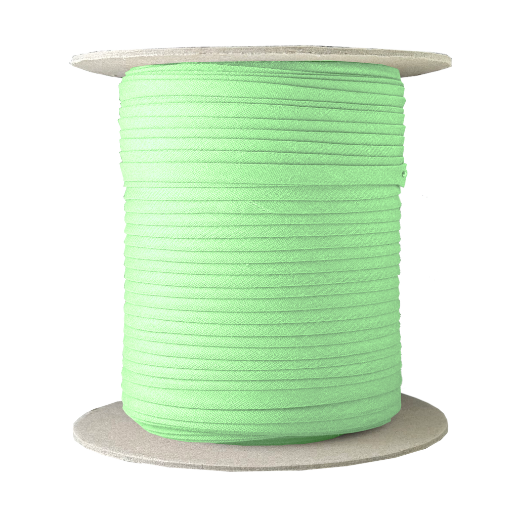 sanibell green 1/4" double fold bias tape on a spool from Heit's Wholesale bulk sewing supply company