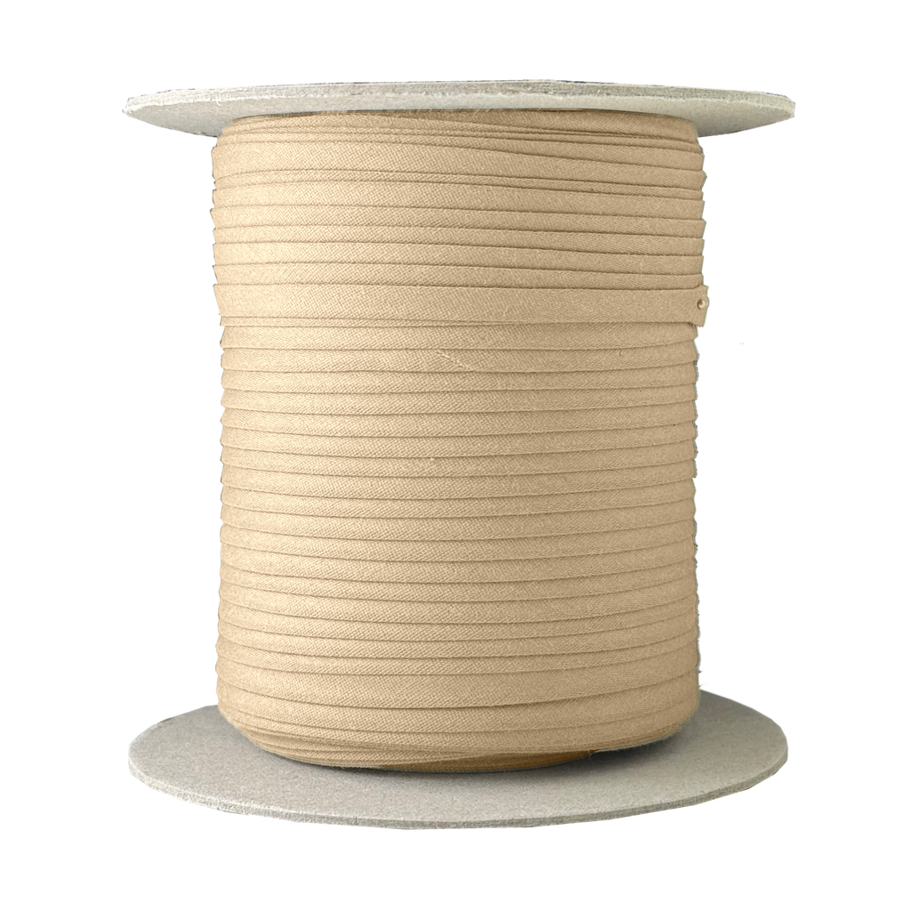spring natural 1/4" double fold bias tape on a spool from Heit's Wholesale bulk sewing supply company