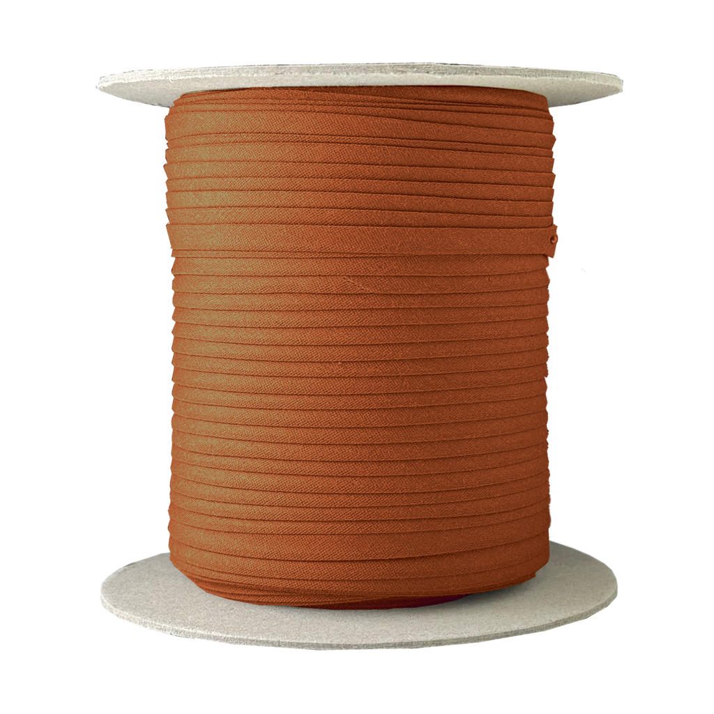 tarnish gold 1/4" double fold bias tape on a spool from Heit's Wholesale bulk sewing supply company