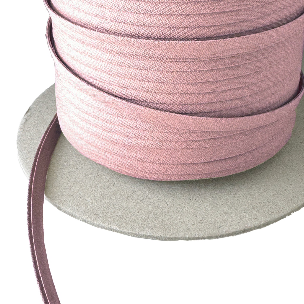 close up of the verrazano 1/4" double fold bias tape on a spool from Heit's Wholesale bulk sewing supply company