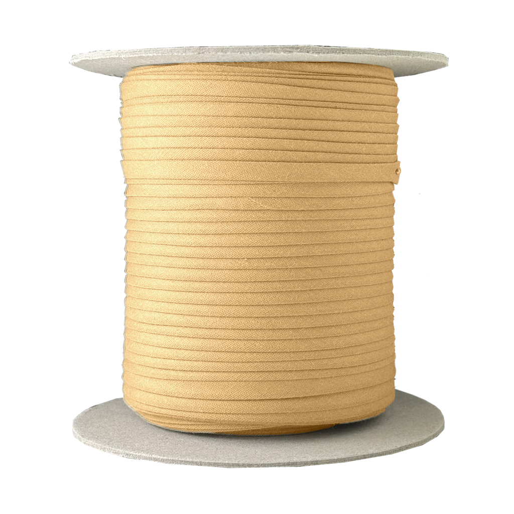 wheat 1/4" double fold bias tape on a spool from Heit's Wholesale bulk sewing supply company