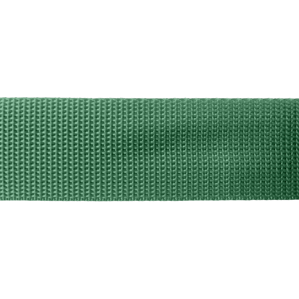 close up of the emerald green 1+1/2" polypro webbing on a spool from Heit's Wholesale bulk sewing supply 