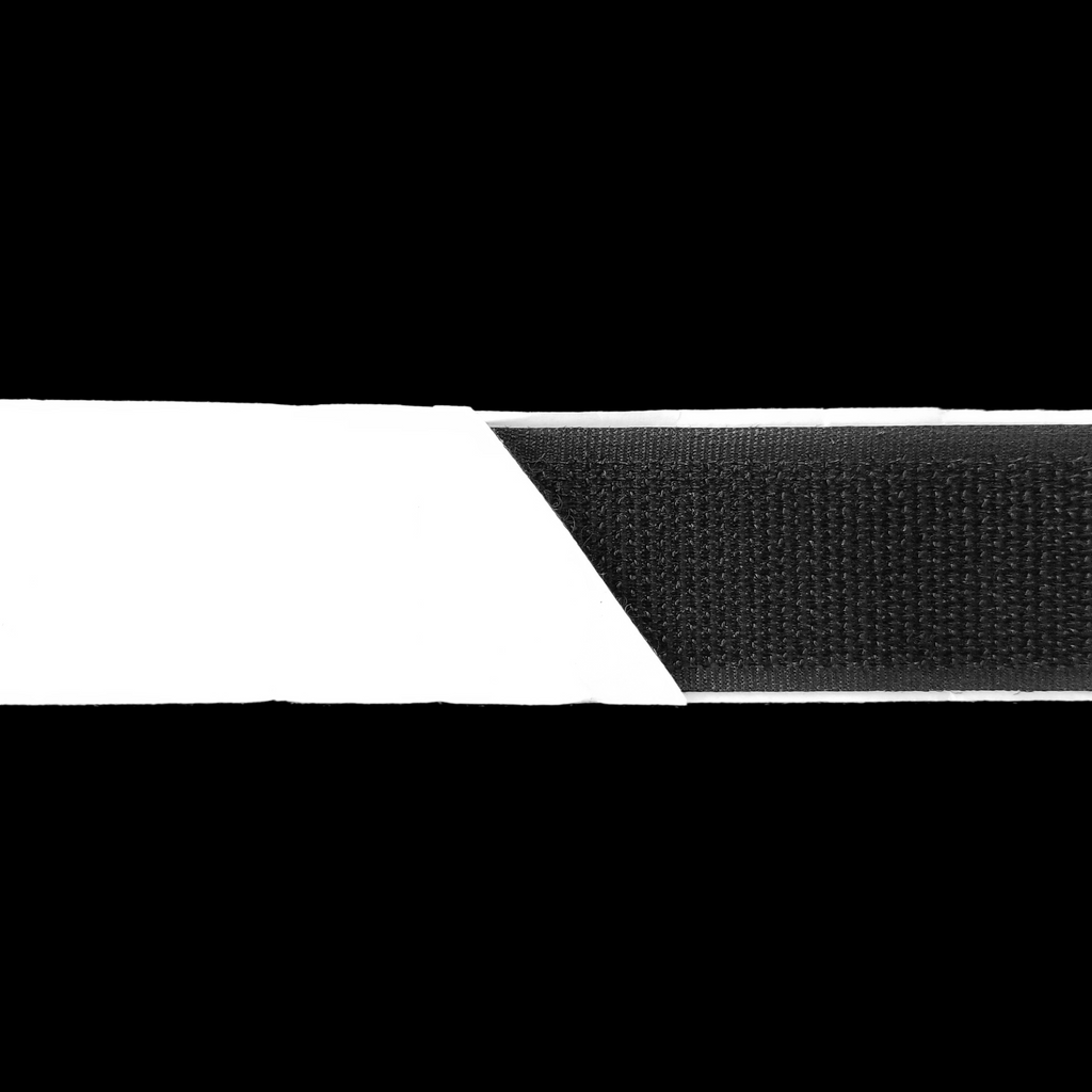 close up of the black 1" self-adhesive Velcro on a spool from Heit's Wholesale bulk sewing supply company