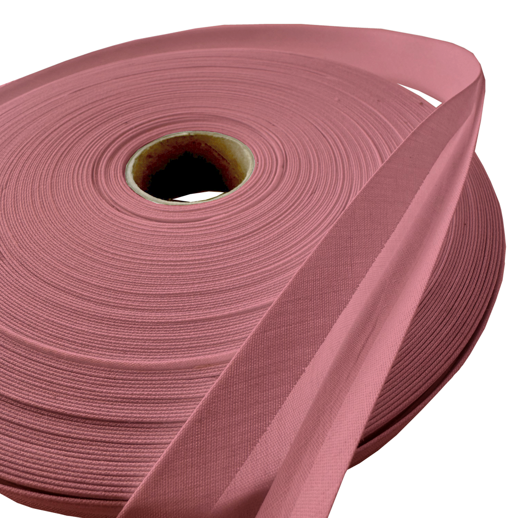 close up of the copper 1" double fold bias tape on a roll from Heit's Wholesale bulk sewing supply company