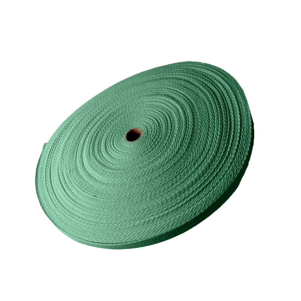 emerald 1" cotton webbing on a spool from Heit's Wholesale bulk sewing supply company