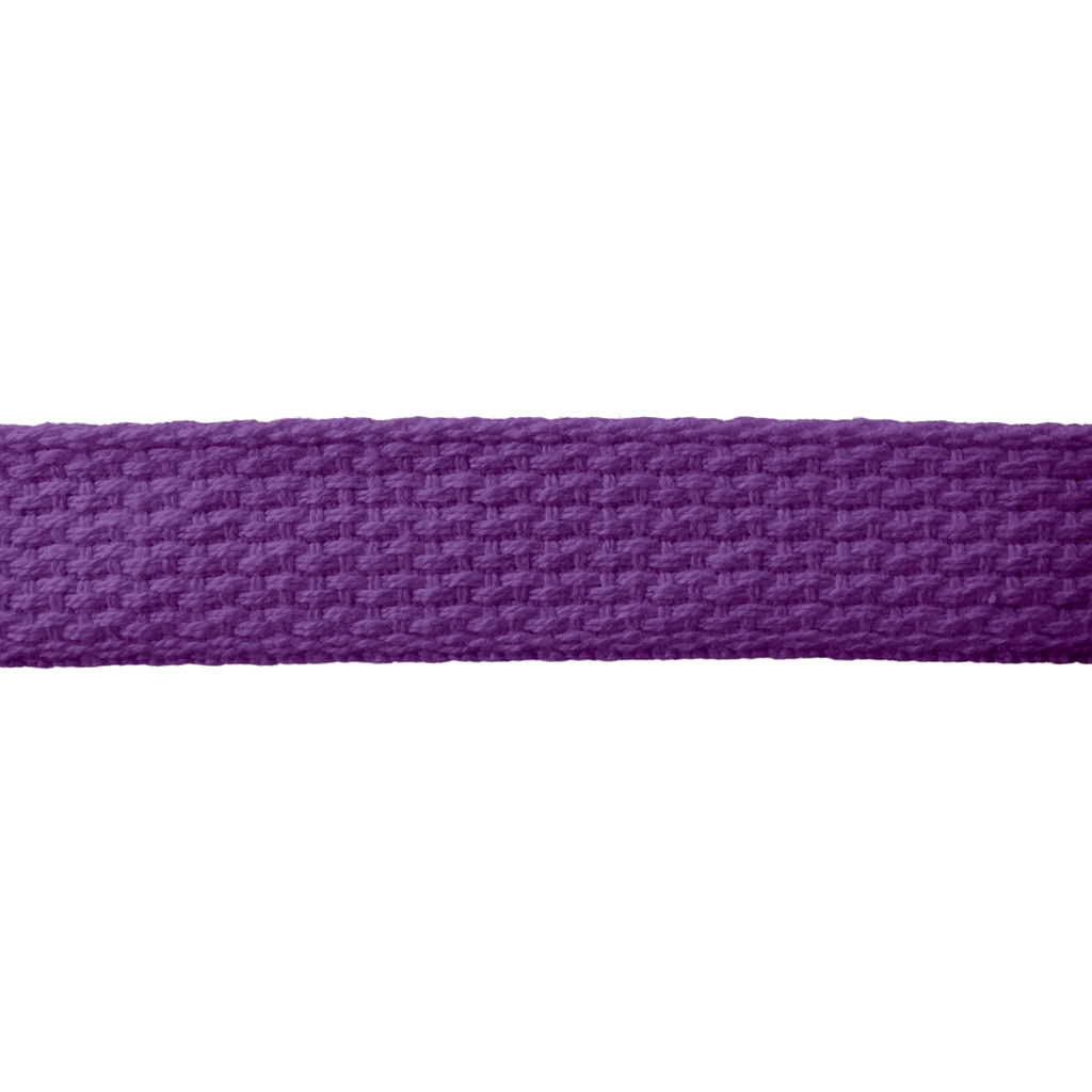 close up of the purple 1" cotton webbing on a spool from Heit's Wholesale bulk sewing supply company