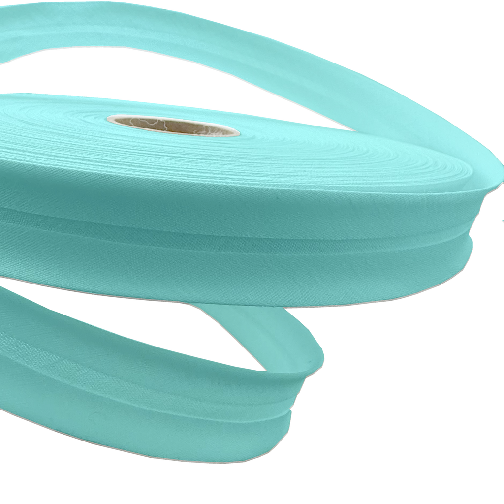 close up of the aqua 1" no gap single fold bias tape on a spool from Heit's Wholesale bulk sewing supply company