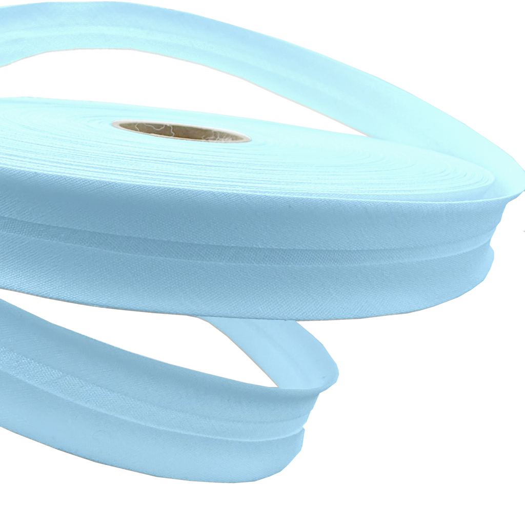 close up of the cloud blue 1" no gap single fold bias tape on a roll from Heit's Wholesale bulk sewing supply company
